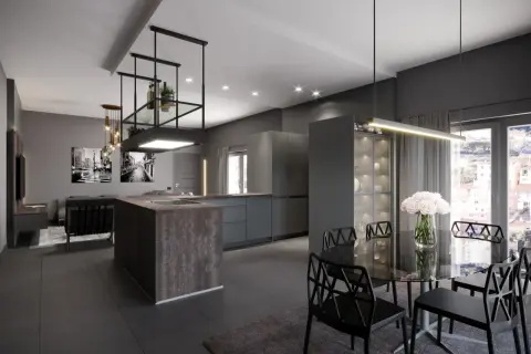Isola cucina con finitura in ardesia, un tocco moderno e raffinato per un ambiente di design.