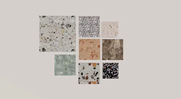 Vari campioni di pavimento scaglietta in diverse colorazioni e granulometrie, dal chiaro al scuro, con inserti di varie pietre.