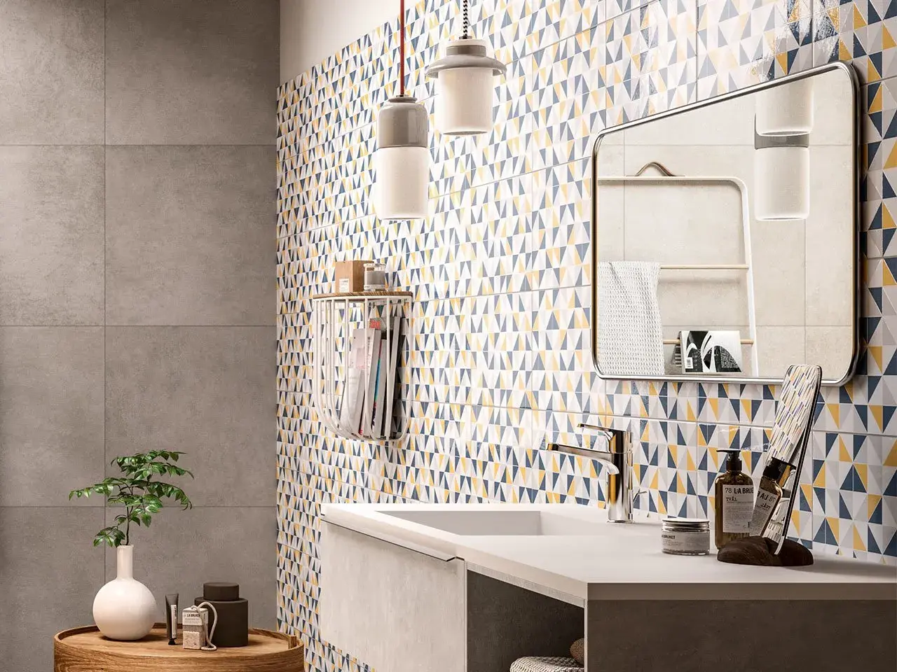 Bagno moderno con parete a triangoli colorati, ideale per chi cerca idee su come rinnovare pavimento in ceramica con stile.
