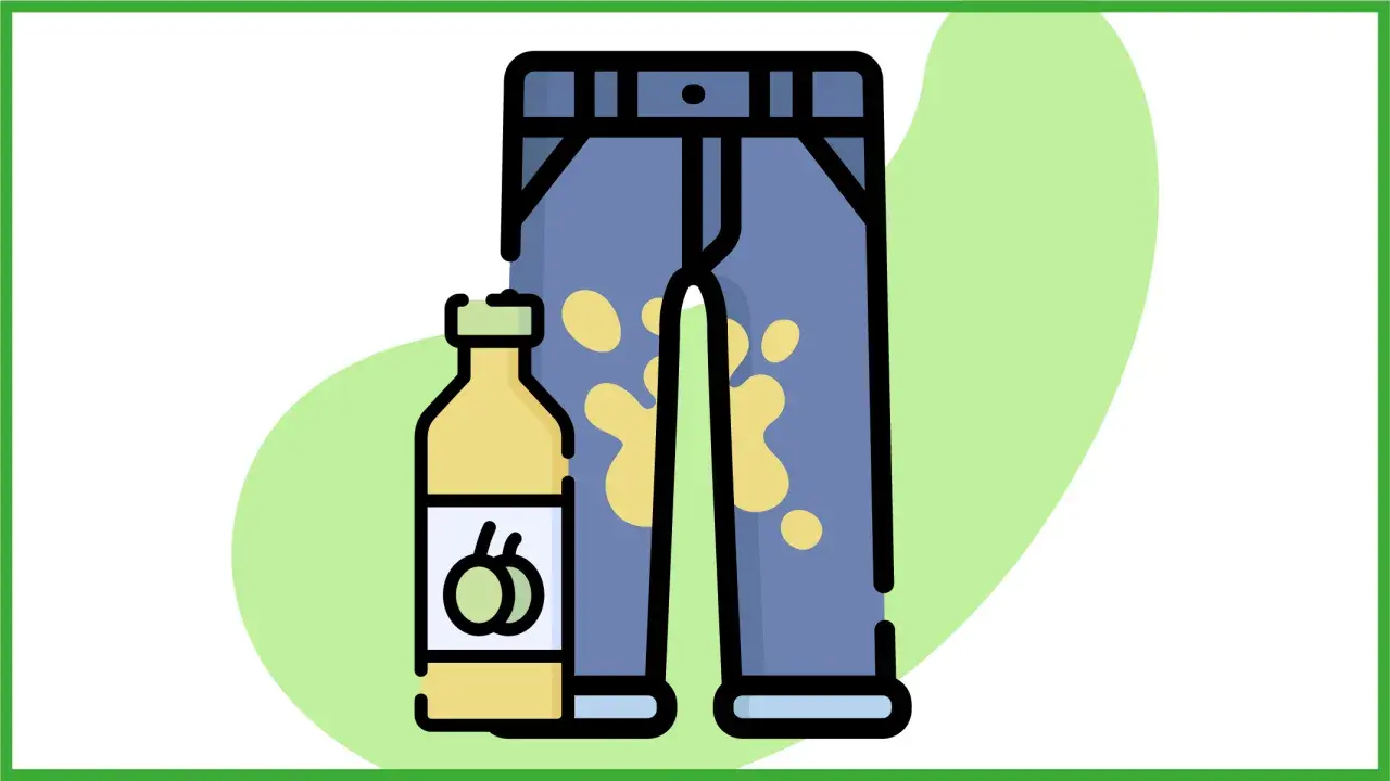 Un flacone di detersivo accanto a un paio di pantaloni con una macchia d'olio gialla.