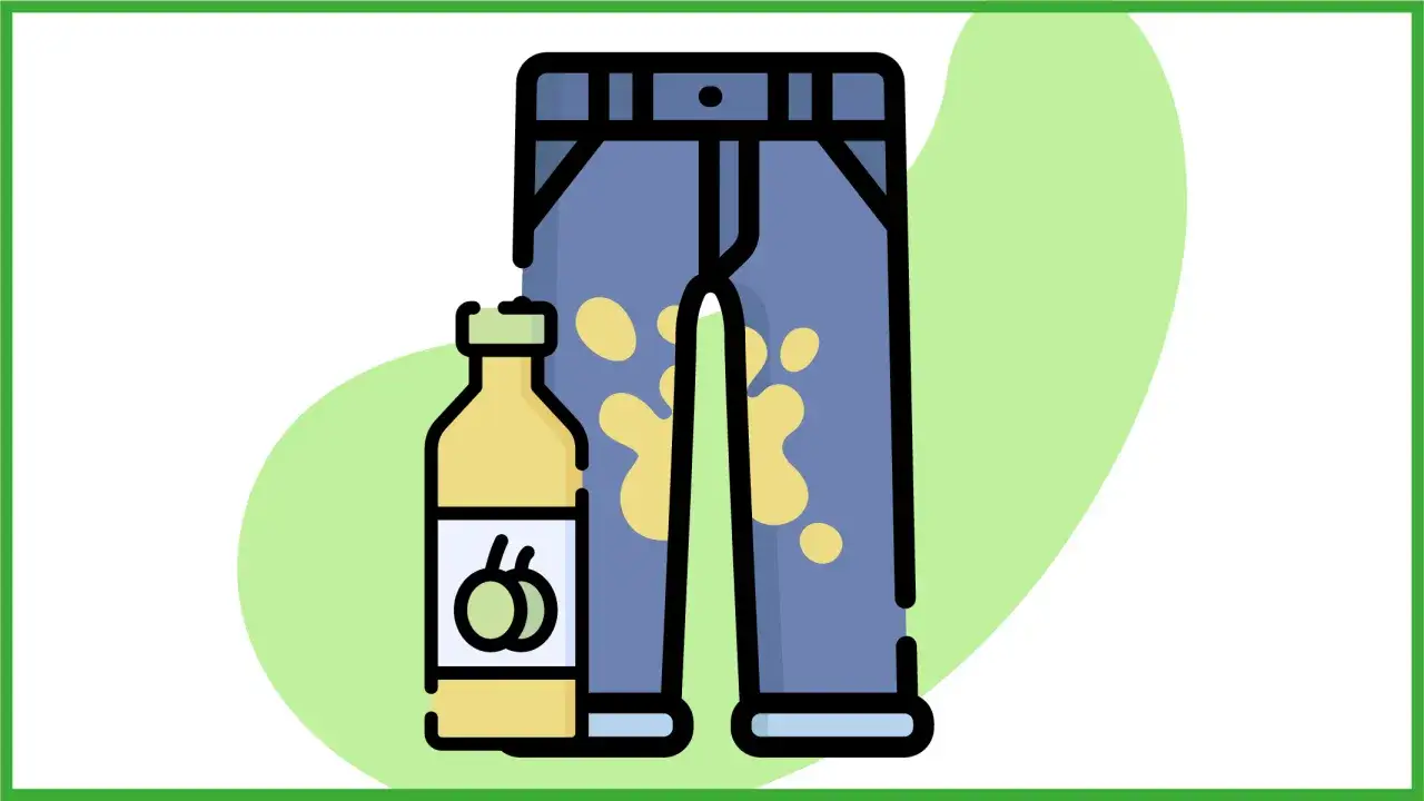 Un flacone di detersivo accanto a un paio di pantaloni con una macchia d'olio gialla.